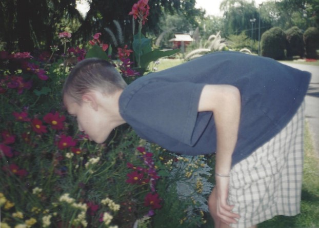 Dallin smelling flowers